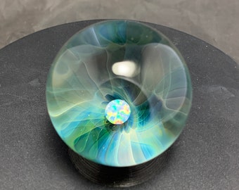 1.97"/50mm handmade silver and gold fumed glass marble with 5mm white Opal coin on galaxy black.