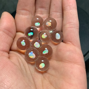One(1) 12-13mm handmade glass valve marble with tumbled white opal