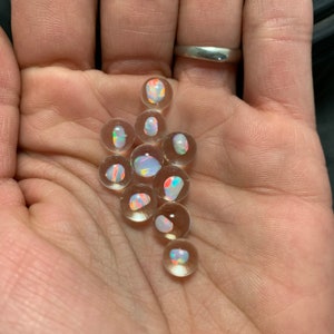 One(1) 7mm-8mm handmade glass pearl marble with tumbled white opal