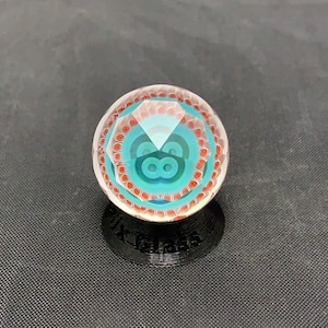 25.8mm faceted glass marble with millie