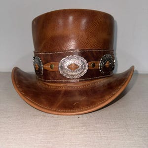 Handmade Brown Leather Top Hat with Silver Conchos Vintage Rock Style Adjustable Fit Perfect for Unique Gifts and Timeless Fashion