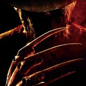 May include: A dark, atmospheric depiction of a figure wearing a wide-brimmed hat and a textured, dark-colored sweater. The figure features a metallic glove with four long, sharp, blade-like fingers extending outward, illuminated by deep red lighting.