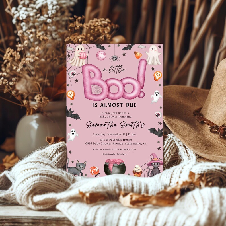 May include: A pink Halloween-themed baby shower invitation with the text "a little Boo! IS ALMOST DUE". The invitation includes illustrations of ghosts, bats, and candy corn. The invitation is for Samantha Smith's baby shower.