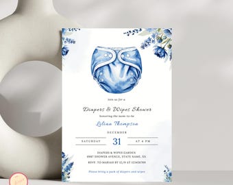 May include: Blue and white baby shower invitation with a watercolor illustration of a diaper. The invitation reads "Join us for a Diapers & Wipes Shower honoring the mom-to-be Lilian Thompson December 31 at 4 PM Diapers & Wipes Garden 0987 Shower Avenue, State Name, XX RSVP. To Mariah by 12/9 at 123456789 Please bring a pack of diapers and wipes"