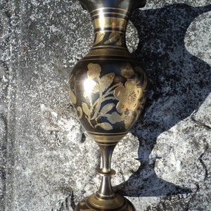 A vintage brass/copper hand carved engraved Indian urn vase Bollywood
