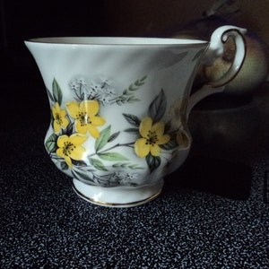 Vintage Rosina fine bone china tea cup coffee Made in England October yellow flower pattern dainty and feminine