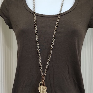 Vintage necklace with 4 different hearts pendants copper and brass