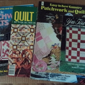 May include: Five quilting books with colorful covers. The books are titled "Lady's Circle Patchwork Quilts", "Quilt", "Easy to Sew Country Patchwork and Quilts", "Your First Quilt: A Beginner's Booklet", and "New Orleans Tradition".