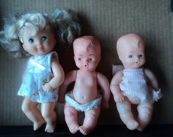 A set of 3 vintage baby dolls big sis and twins 1996 and older