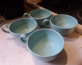 A set of four vintage blue lucite plastic coffee cups mugs kitchen decor