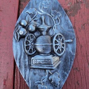 Vintage kitchen wall plaque ceramic painted pewter vegetable press industrial decor