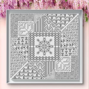 May include: A framed, black and white cross-stitch sampler with geometric and floral patterns. The design is composed of various shapes, including squares and triangles, each filled with intricate stitch work. The sampler is displayed in a white frame.