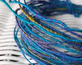 Wool Fiber Wire in turquois, purple, and yellow