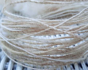 Fiber wire in a variety of natural, undyed fiber types, including merino wool, Teeswater wool, alpaca, angora bunny, and silk