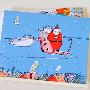 The Stowaways- Funny Christmas Cat Card for Cat Lovers by The Dancing Cat