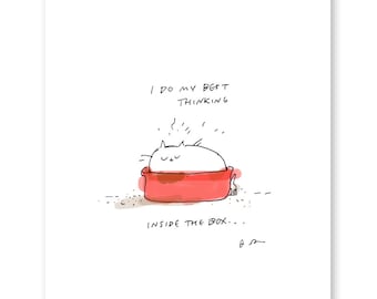 May include: A white cat with closed eyes is lying in a red bowl. The cat is thinking inside the box. The text says "I do my best thinking inside the box..."