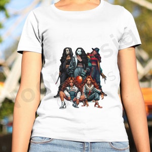 May include: White t-shirt with a graphic print of five women dressed as horror movie characters. The women are holding weapons and a red balloon.