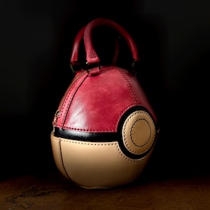 May include: A set of three ceramic mugs with a speckled, matte finish. The mugs are in shades of cream, light gray, and dark gray. Each mug has a simple, minimalist design and a rounded handle.