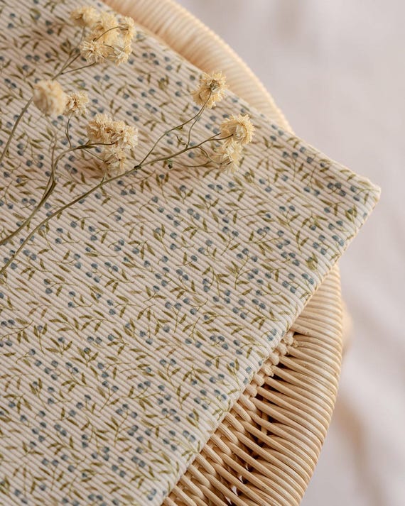 Floral pattern rib jersey fabric, soft and stretchy ribbed jersey material, creamy background - fabric by the yard