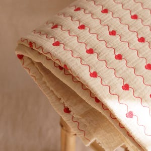 Red heart embroidery quilted cotton fabric – natural padded material