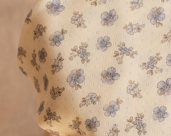 Blue floral pointelle cotton jersey, soft openwork knit, vintage botanical fabric