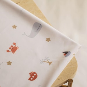 Swimsuit Fabric - playful pattern of crabs and whales – stretchy, quick-drying fabric, swimwear, beachwear.