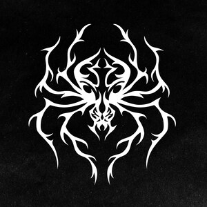 White decal sticker of a tribal tattoo style spider.