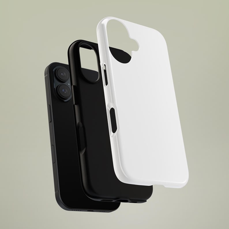 May include: A black smartphone with a black phone case and a white phone case. The phone has two camera lenses. The cases are designed to protect the phone from damage.