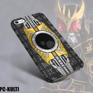 May include: A black phone case with a yellow and silver design. The case features a large black circle in the center, surrounded by a yellow and silver pattern. The case has the text "PC-KULTI" at the bottom.
