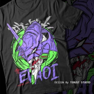 May include: Black t-shirt featuring a purple and green graphic of a robotic head with the text "EVA AOI". The design includes a green circle and Japanese-style characters. "DESIGN By TERUST STUDIO" is printed on the right side.