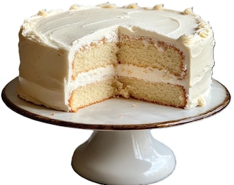 May include: A white cake with white frosting, decorated with a simple swirl design. The cake is on a white cake stand with a brown rim.