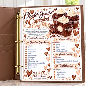 May include: A brown three-ring binder holding a recipe page for Chocolate Ganache Cupcakes with Cream Filling. The page features illustrations of cupcakes, lists ingredients for the cake, filling, ganache, and frosting, and includes the text bake145.com.