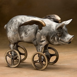 Flying Pig Coin Bank Item 918, Cast Aluminum with Bronze Wheels image 1