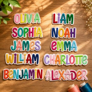May include: A collection of embroidered name patches featuring the names Olivia, Liam, Sophia, Noah, James, Emma, William, Charlotte, Benjamin, and Alexander. Each letter is rendered in a vibrant, multi-coloured, puffy, rounded font style.