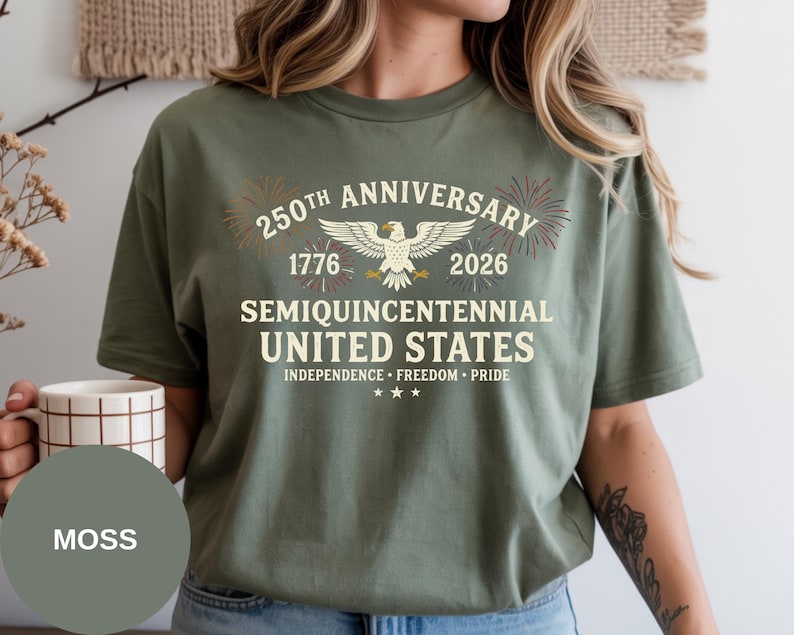 Commemorate America’s 250th Anniversary with this premium Comfort Colors® graphic tee. Fireworks accents and vintage eagle artwork create a timeless patriotic look. Soft-washed and garment-dyed, this Comfort Colors® shirt delivers a relaxed fit and lived-in comfort, making it perfect for Independence Day outfits or patriotic gifting.