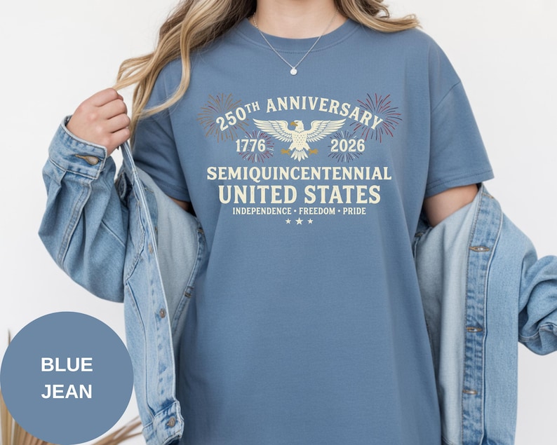 Honor 250 years of independence with this vintage-inspired Comfort Colors® USA shirt. The 1776–2026 anniversary artwork blends heritage fonts, patriotic fireworks, and a detailed eagle graphic. Garment-dyed for rich color and softness, this Comfort Colors® tee feels broken-in from day one. Perfect for parades, BBQs, and patriotic family gatherings.