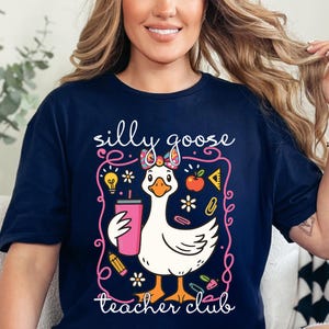 Join the club 🪿 The Silly Goose Teacher Club tee is a must-have for educators with a sense of humor. Whether it’s Teacher Appreciation Week or the last day of school, this shirt brings smiles to students and coworkers alike. A great gift for elementary, kindergarten, and preschool teachers.