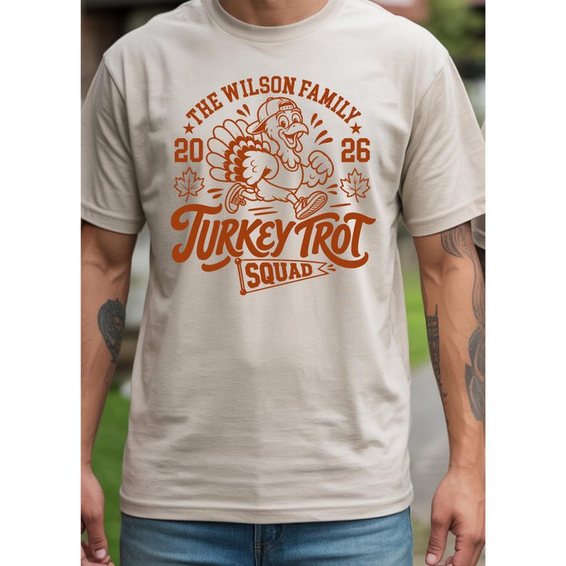 A person wearing a t-shirt with a graphic design featuring a turkey and the text "The Wilson Family Thanksgiving 2016 Turkey Trot Squad".