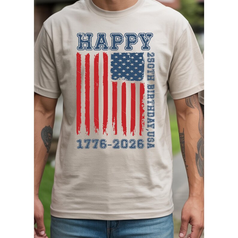 This patriotic youth tee is designed for kids who want to join the 2026 celebration of America’s 250th birthday. The vintage distressed flag, bold “Happy” text, and 1776-2026 detail create a festive yet classic look that works for boys and girls alike. Ideal for parades, fireworks, classroom celebrations, family matching shirts, and Independence Day trips, this shirt is a great way to honor the nation’s milestone birthday in fun everyday style.