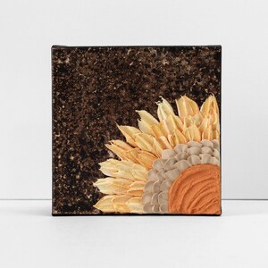 Front view of orange sunflower painting with impasto on a little canvas for a miniature art collection