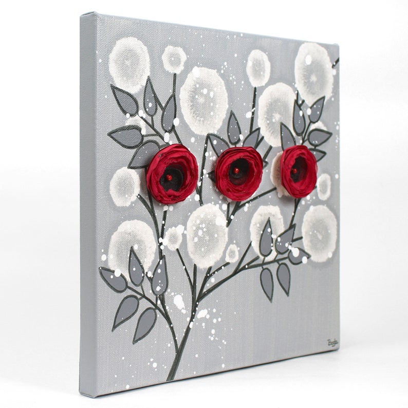 Side view of red rose painting with fluffy hand crafted flowers on a small canvas in red and gray