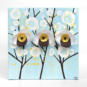 Front view of cheerful painting gift for mom with 3d flowers on a small canvas art in blue, yellow, and white