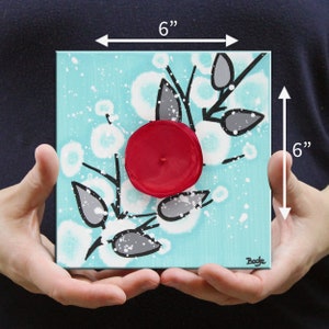 Miniature size guide for 6x6 painting on canvas with 3d flower in red, black, and aqua