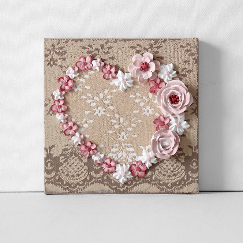 Front view of little valentine heart painting with sculpted roses on a lacy textured canvas as miniature shelf decor