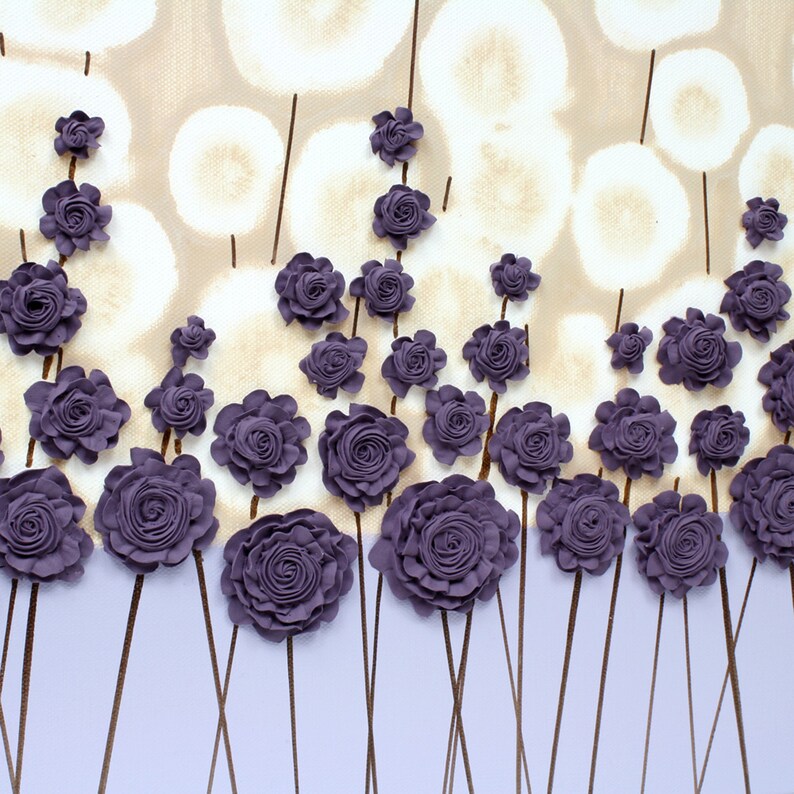 Center view of color block painting of textured wildflowers on canvas in purple and beige