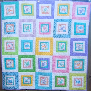 Fun and colorful baby quilt, baby girl quilt, cute baby quilt