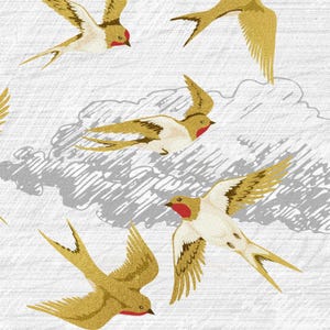 May include: A repeating pattern of gold and white birds with red accents, flying against a textured white background with gray cloud-like shapes. The birds have detailed wing patterns and are in various positions.