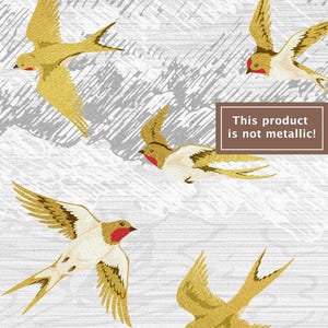 May include: Illustration of several birds in flight, featuring gold and white coloring with red accents. The birds are set against a textured gray and white background. Text in a brown box reads: "This product is not metallic!"