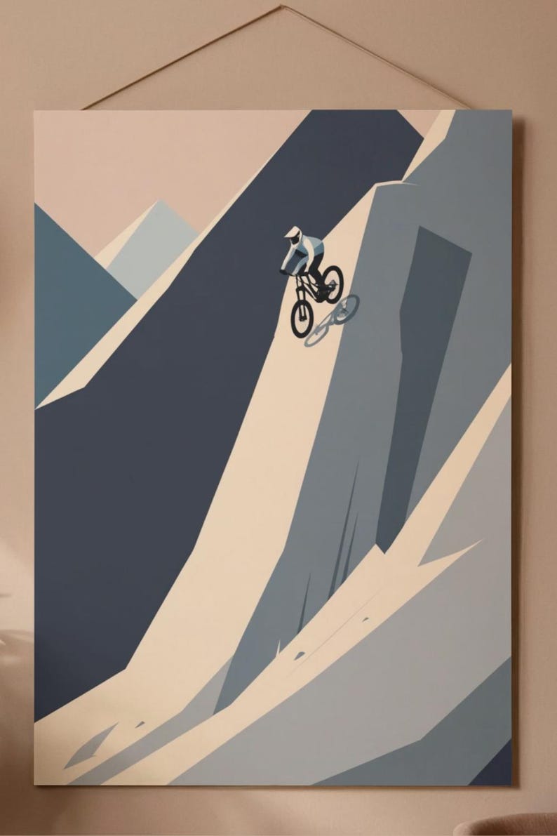 May include: A mountain biking art print depicts a cyclist descending a steep mountain slope. The artwork uses a minimalist style with shades of blue, gray, and beige. The cyclist is wearing a white helmet and blue clothing.