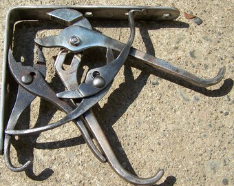 Pliers shelf bracket pair with hooks for coats, hats, aprons, purses or whatever.